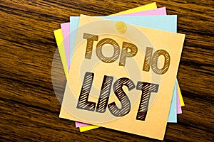 Conceptual hand writing text caption inspiration showing Top 10 Ten List. Business concept for Success ten list written on sticky