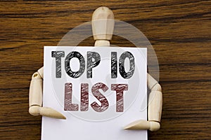Conceptual hand writing text caption inspiration showing Top 10 Ten List. Business concept for Success ten list written on sticky