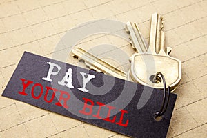 Conceptual hand writing text caption showing Pay Your Bill. Business concept for Payment for Goverment written on note paper attac