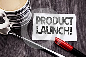 Conceptual hand writing text caption showing Product Launch. Business concept for New Products Start written on sticky note paper
