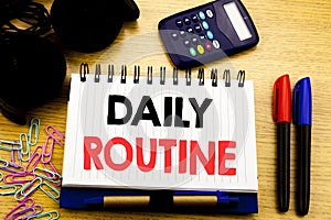 Conceptual hand writing text caption showing Daily Routine. Business concept for Habitual Lifestyle written on notebook book on th
