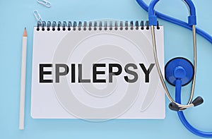 Conceptual Hand writing text Epilepsy. Medical care Health concept written on light blue background