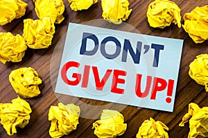 Conceptual hand writing text inspiration showing Don t Give Up. Business concept for Motivation Determination, written on sticky n