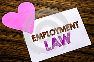 Conceptual hand writing text showing Employment Law. Concept for Employee Legal Justice written on sticky note paper, wooden wood