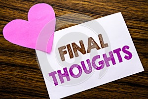 Conceptual hand writing text showing Final Thoughts. Concept for Conclusion Summary Text written on sticky note paper, wooden wood