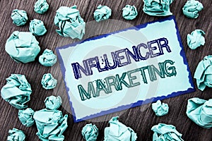 Conceptual hand writing text showing Influancer Marketing. Concept meaning Social Media Online Influence Strategy written on Stick