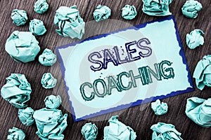 Conceptual hand writing text showing Sales Coaching. Concept meaning Business Goal Achievement Mentoring written on Sticky note pa