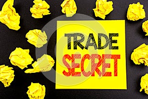 Conceptual hand writing text showing Trade Secret. Business concept for Data Protection written on sticky note paper. Folded yello