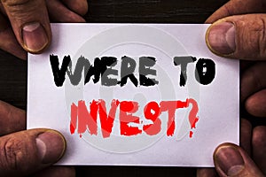 Conceptual hand writing text showing Where To Invest Question. Concept meaning Financial Income Investing Plan Advice Wealth writt