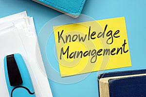 Conceptual hand written text showing Knowledge Management