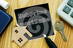 Conceptual hand written text showing Subprime mortgage photo
