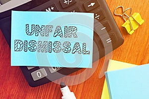 Conceptual hand written text showing unfair dismissal