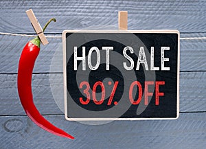 Conceptual hot sale sign with a red chili pepper