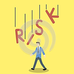 Conceptual illustration of businessman in danger by the RISK word is falling on his body