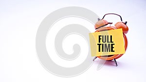 Conceptual image of Business Concept with words Full Time on a clock with a white background. Selective focus.