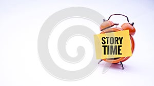 Conceptual image of Business Concept with words Story Time on a clock with a white background. Selective focus.
