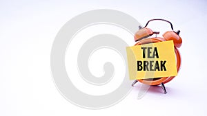 Conceptual image of Business Concept with words Tea Break on a clock with a white background. Selective focus.