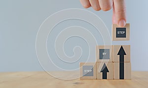 Conceptual image of business vision..Work step by step. The ladder of success. Business and workflow plan. Sustainability. Hand ar