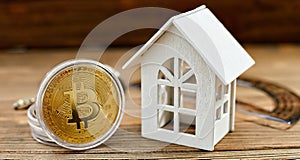 Conceptual image for investors in cryptocurrency . Bitcoins accepted here  services in hotel, rental, buying house