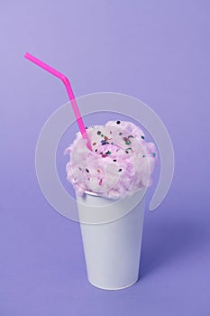 Conceptual image of milkshake with pink foam