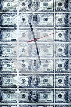 Conceptual image of one hundred dollar bills and clock