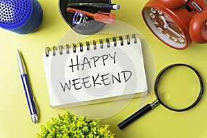 Conceptual image. paper note writing with alarm clock, vase, stationery, pen, magnifying glass and portable mini loud speaker