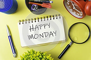 Conceptual image. paper note writing with alarm clock, vase, stationery, pen, magnifying glass and portable mini loud speaker