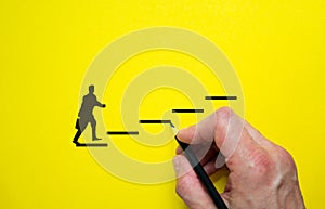 Conceptual image of personal vision, education and development. Beautiful yellow background, copy space. Businessman icon