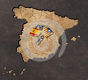 Conceptual image of the political conflict between Spain and Catalonia. Padlocks on map of Spain. Declaration of independence on