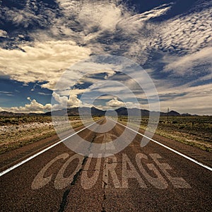 Conceptual Image of Road With the Word Courage