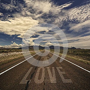 Conceptual Image of Road with the Word Love