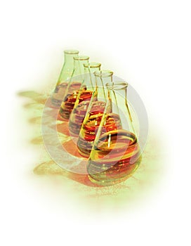 Conceptual image of row of chemical flasks with orange solutions on green surface with subtle chemical formulas in the background