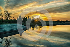 Conceptual image of sunset at lakeside.