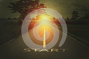 Conceptual image with text word start on asphalt road