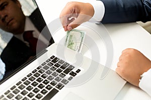 Conceptual photo of businessman receiving digital money transfer