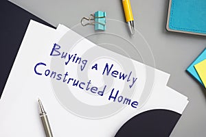 Conceptual photo about Buying a Newly Constructed Home with handwritten text