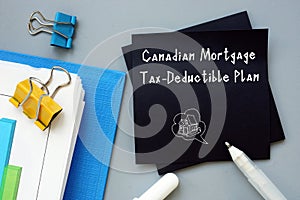 Conceptual photo about Canadian Mortgage Tax-Deductible Plan with written text