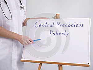 Conceptual photo about Central Precocious Puberty with handwritten text