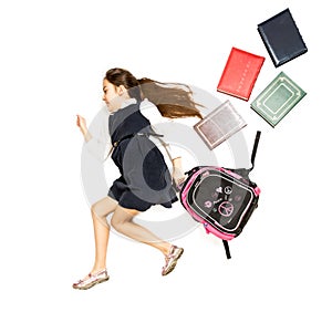 Conceptual photo of cute schoolgirl running to school with backp