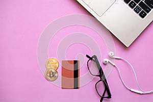 Conceptual photo of e-commerce with credit cards and cryptocurrency.