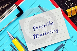 Conceptual photo about Guerrilla Marketing with handwritten phrase