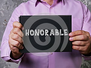 Conceptual photo about HONORABLE with handwritten phrase