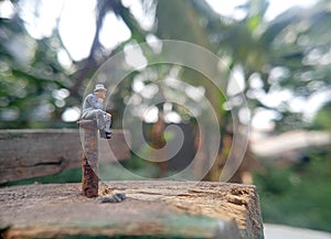 Conceptual Photo, Illustration for Dangerous and Critical Fate, Depression Sitting Man, at Corrosive Nail