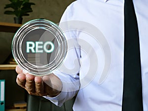 Conceptual photo about Real Estate Owned REO with written text