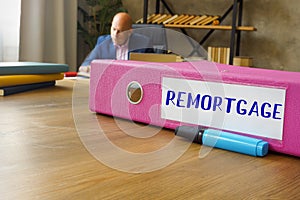 Conceptual photo about REMORTGAGE with handwritten text