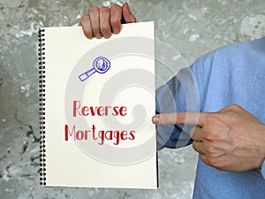 Conceptual photo about Reverse Mortgages with handwritten text