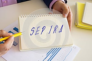 Conceptual photo about SEP IRA simplified employee pension individual retirement account with written phrase