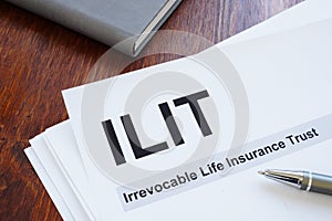 Conceptual photo showing printed text irrevocable life insurance trust ILIT photo