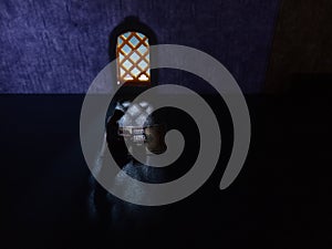 Conceptual Photo, Sitting Muslim, Islam People, Reading Al Quran at Mosque near Yellow Window, with blank space for area placement