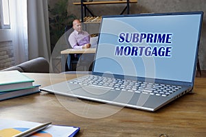 Conceptual photo about SUBPRIME MORTGAGE with handwritten text